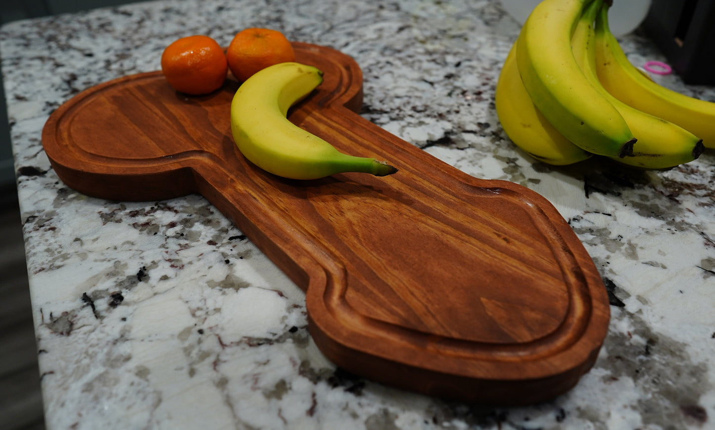 Penish shaped cutting board serving tray.