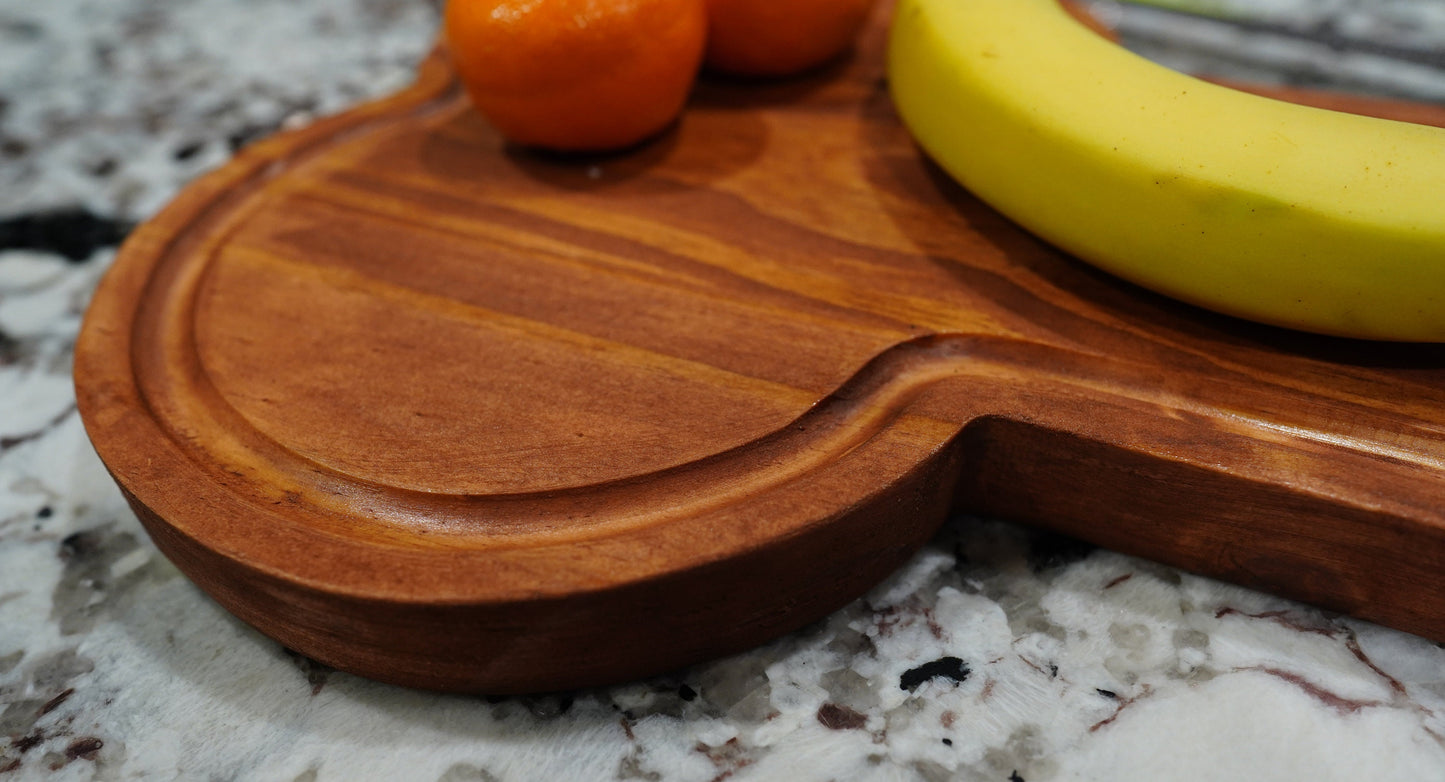 Penish shaped cutting board serving tray.