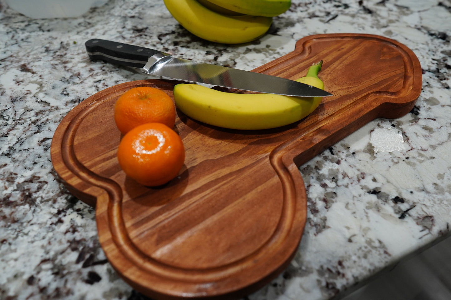 Penish shaped cutting board serving tray.